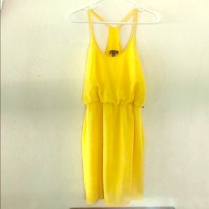 Woman’s yellow racer back dress